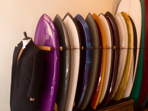 An image of topcoat and surfboards in Saturdays NYC Crosby Street store