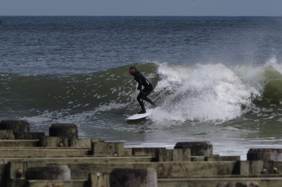 surfers on Jersey shore